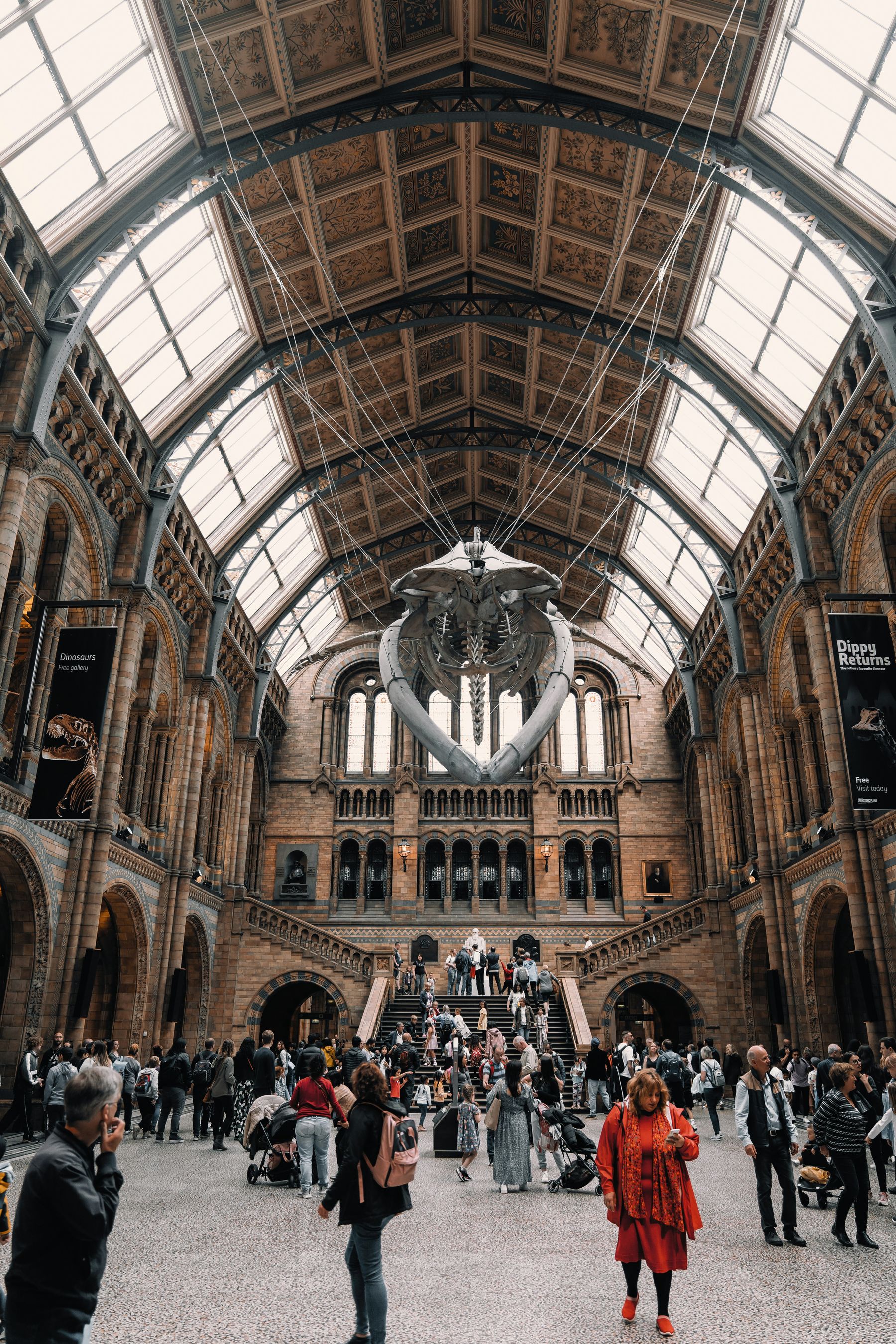 Students and visitors inside a historic European university hall